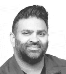 Nilay Patel headshot, smiling with short hair and beard.